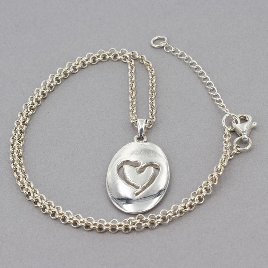 Robert Lee Morris RLM Studio Sterling Silver Cut-Out Heart Oval Pendant Necklace